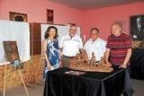 Güre ADD sergi salonunda yaşamı yitiren ceviz ağaçları heykel olarak